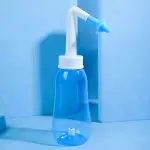 Портативний сольовий розчин для полоскання носа. Пляшка для очищення носа